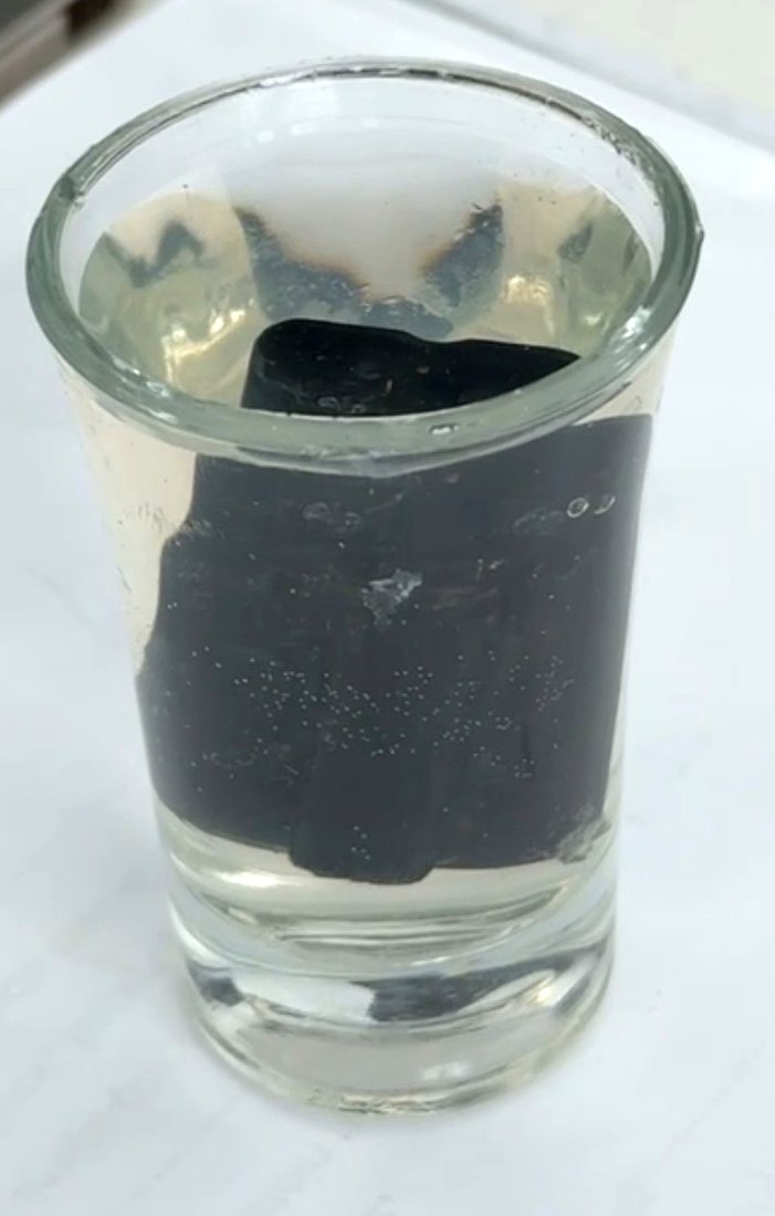 Submerged in water after coating